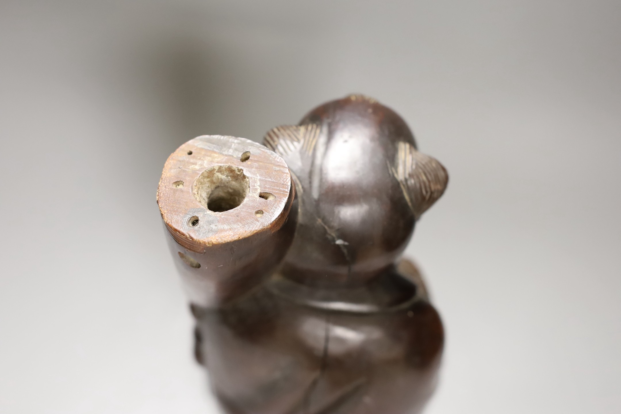 A Chinese hardwood figure of an immortal, 36cm